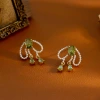 Hyacinth's niche design of high-end new bow earrings, stud earrings, versatile ear clips, and olive green zircon pearl tassel earrings Application Scenario